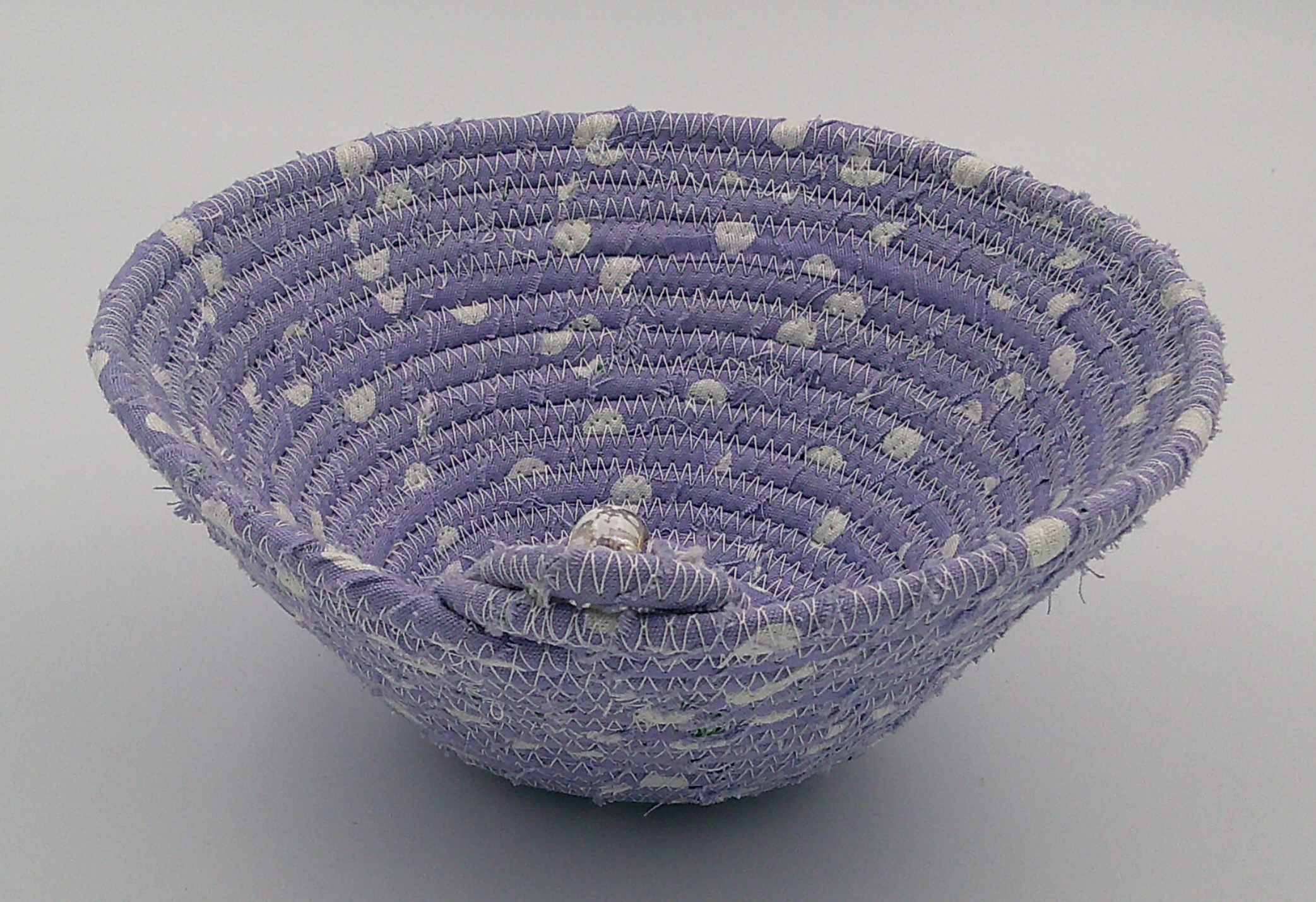 This view is looking from the outside of the embellishment across to the other side of the bowl. This view is looking from the outside of the embellishment across to the other side of the bowl.